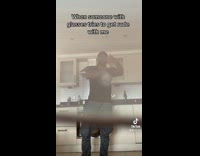 Man breathe on glasses of someone rude