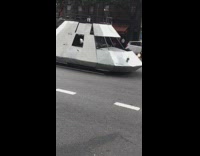 Car covered in metal sheets ufo spaceship 