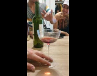 Wine inside the wine glass vibrates by the soundwaves