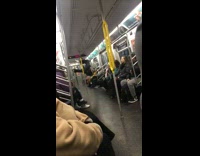 Subway dancer spins and flips around on rails to music