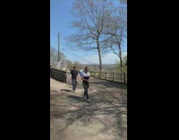 Girl blue ballgown dress wood fence park 