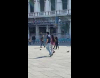 Man and woman tiktok dance on the park