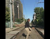 Guy does the church dance challenge on train tracks, grocery store, and in front of car with friend