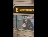 Woman sleeps on subway face mask over eyes