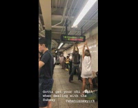 Couple man and woman does yoga mediation and copy each others poses at subway station 