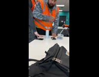 Collab BitchIG2 - Guy orange vest pretends to choke Heimlich maneuver 