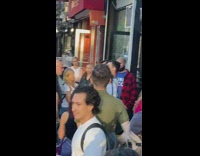 Group of people waiting outside of apartment to view listing 