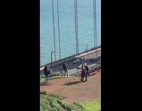 Tourist couple selfie san francisco golden gate bridge