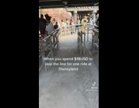 Walking through empty row in amusement park 