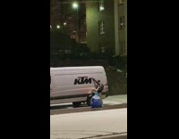 Girl poses with white work van
