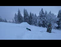 Guy rides black snowboard up ramp fail 
