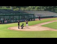 Baseball player runs into wall flips over