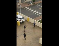 Guy black jacket rap white car rooftop