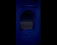 Plane view of storm clouds lightning night