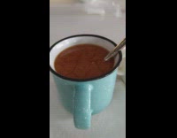 Coffee and cream mixed and move slowly inside the cup