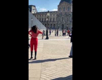 Woman red top pants tiktok dance paris Louvre