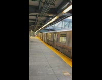 Guy grey jacket sit on top of moving train