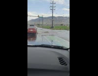 Flood water overflow from drainage road car