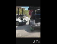 Collab SendItOfficiall - Red shirt guy drives black golf cart 