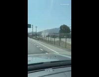 Guy sees tornado forming by gas station