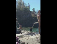 Four women bikini photo shoot beach rocks