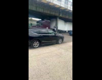 Tractor trailer truck crashed under train tracks 