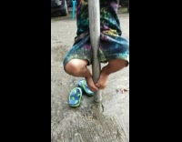 Little kid is scared of falling off pole