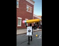 Man in doodblebob costume runs on street