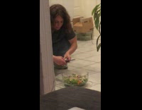 Black shirt foodie girl kitchen floor salad 