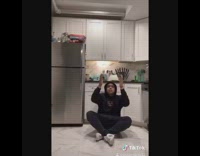 Guy in the house bored white shoes 