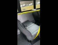 Yellow caution tape bus seats social distancing 