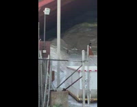 Woman white bikini under bridge construction sand