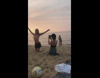 Guy whip long hair kneel sand sunset