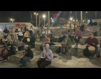 People dance to drums at huntington beach 