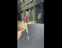 Man blue beanie woman red jacket coffee 