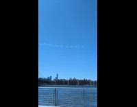 Airplanes spell out message in the sky