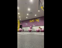Woman surfing on workout balls 