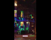 Glow in the dark skeletons decorate apartment building for halloween 