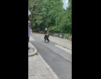 Man rides balance board with bird wings 