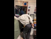 Guy watch horse race slap his butt