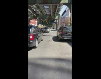 Truck car drives backwards street road 