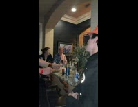 Guy in orange hat turns around stares