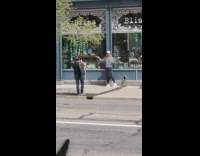 Woman gray jacket orange face mask photo shoot store Bliss