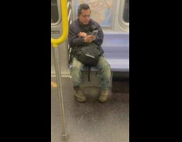 Corona virus cough guy moves seats subway 