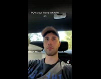 Man Listens to Radio as Car Travel