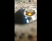 Bubble with smaller bubbles in soda bottle 