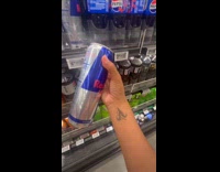 Woman sees 20 FL OZ of redbull in store
