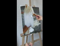 Girl paints over finished painting and uses it as blank canvas 