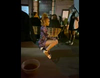 Woman violet floral dress pictorial restaurant nighttime