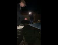 Guy front flips breaks ping pong table